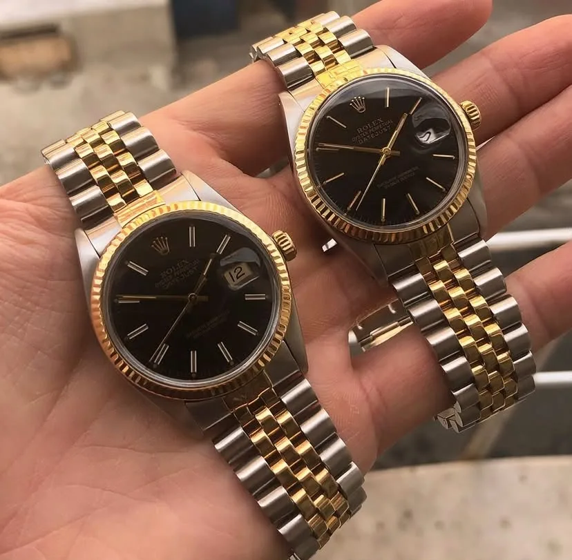 Elde tutulan iki adet siyah kadranlı çelik-altın vintage Rolex Datejust