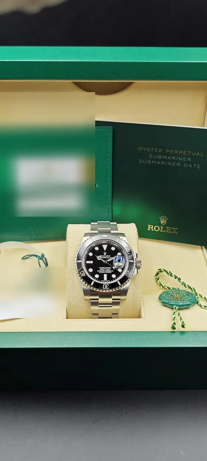 Kutusu ve belgeleriyle siyah Rolex Submariner
